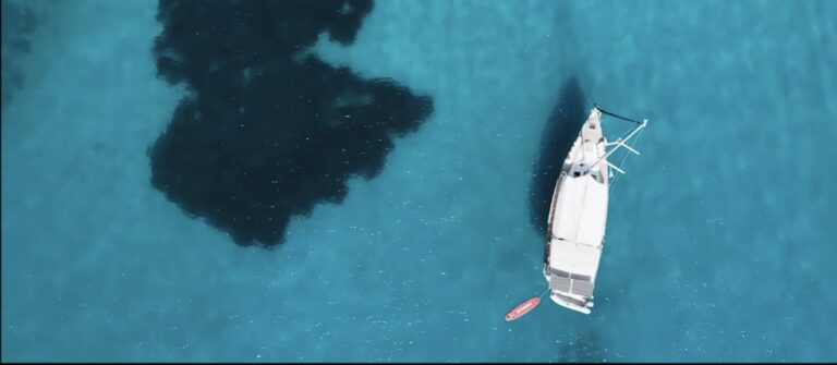Aerial view of a boat in Aliki bay on Thassos