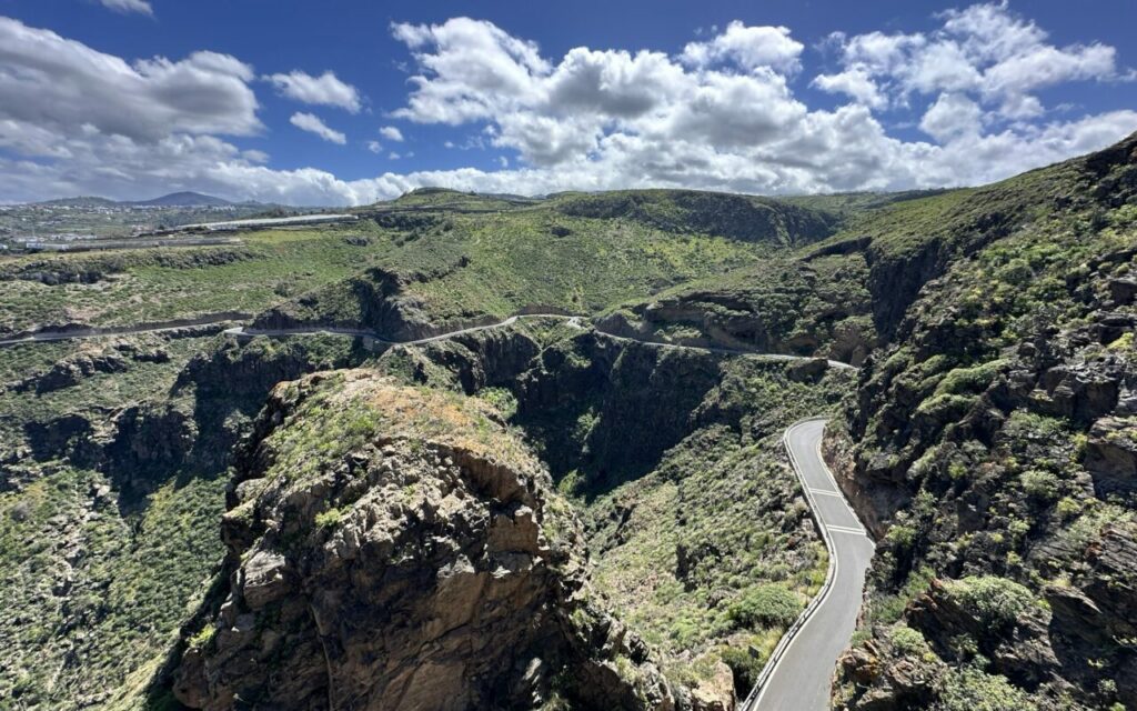 A deep gorge with a road below Cenobio de Valerón in the north of Gran Canaria