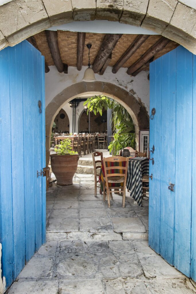 A blue door at the entrance to a traditional taverna, South Cyprus