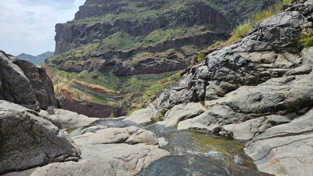 Pools above the waterfall and the colourful rocks of Fuente de los Azulejos