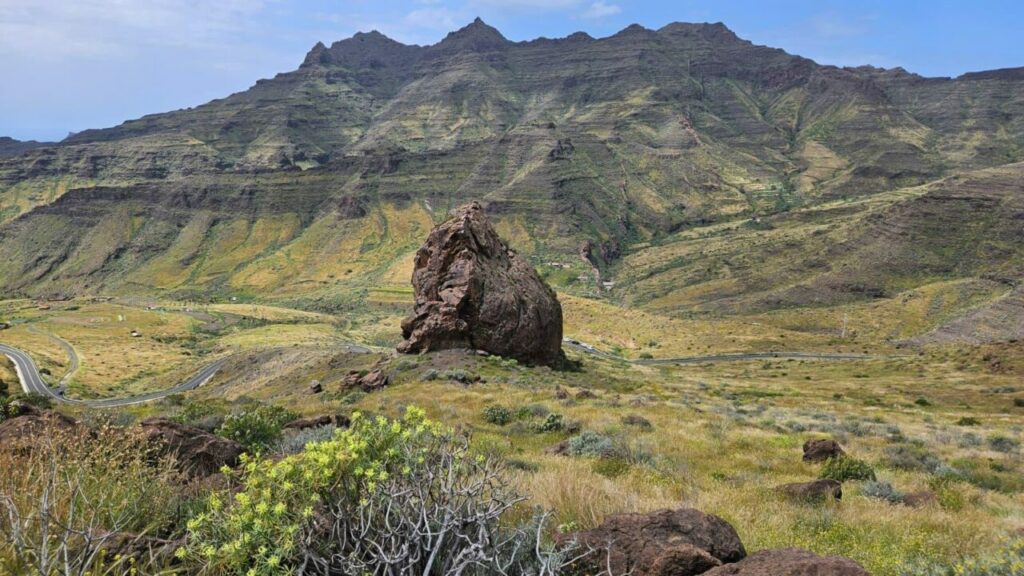 Mountains and a solitary rock in the landscape of south-west Gran Canaria