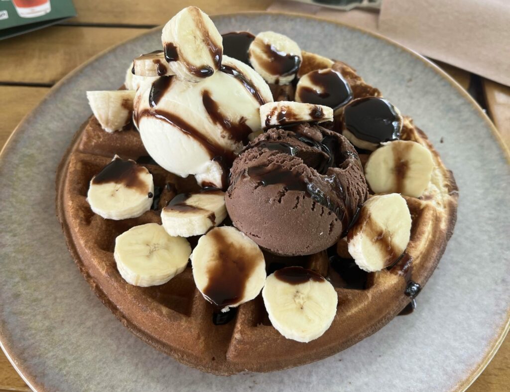 A waffle with chocolate and banana by the spring of love in the village of Panagia on Thassos