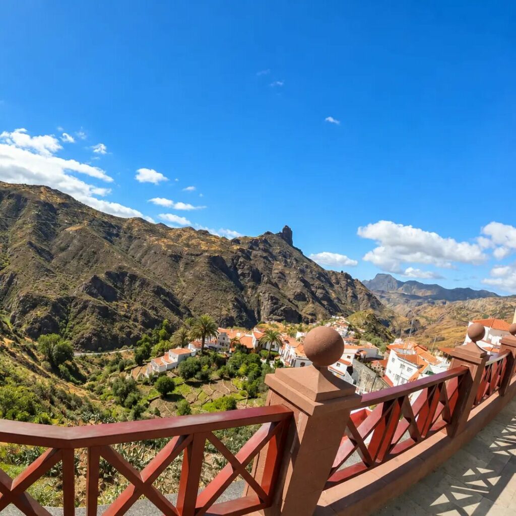 Tejeda: the white houses of the mountain village and the Roque Bentayga rock on Gran Canaria